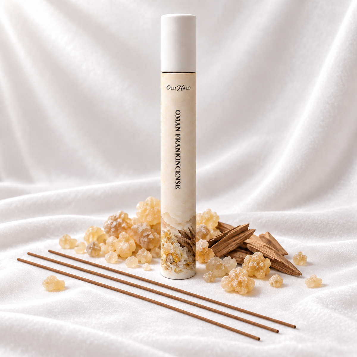 OudHalo 20g Oman Frankincense incense tube with raw materials and coreless sticks on white velvet