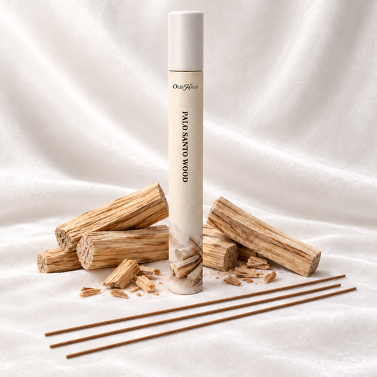 OudHalo 20g Palo Santo Wood incense tube with raw materials and coreless sticks on white velvet