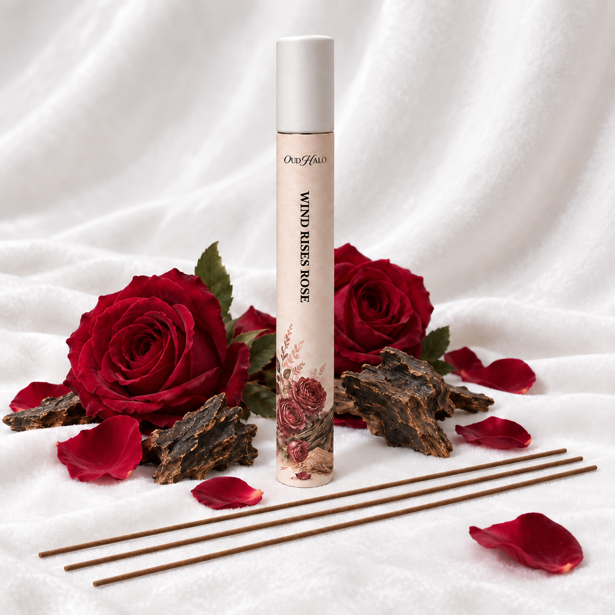 OudHalo 20g Wind Rises Rose incense tube with raw materials and coreless sticks on white velvet